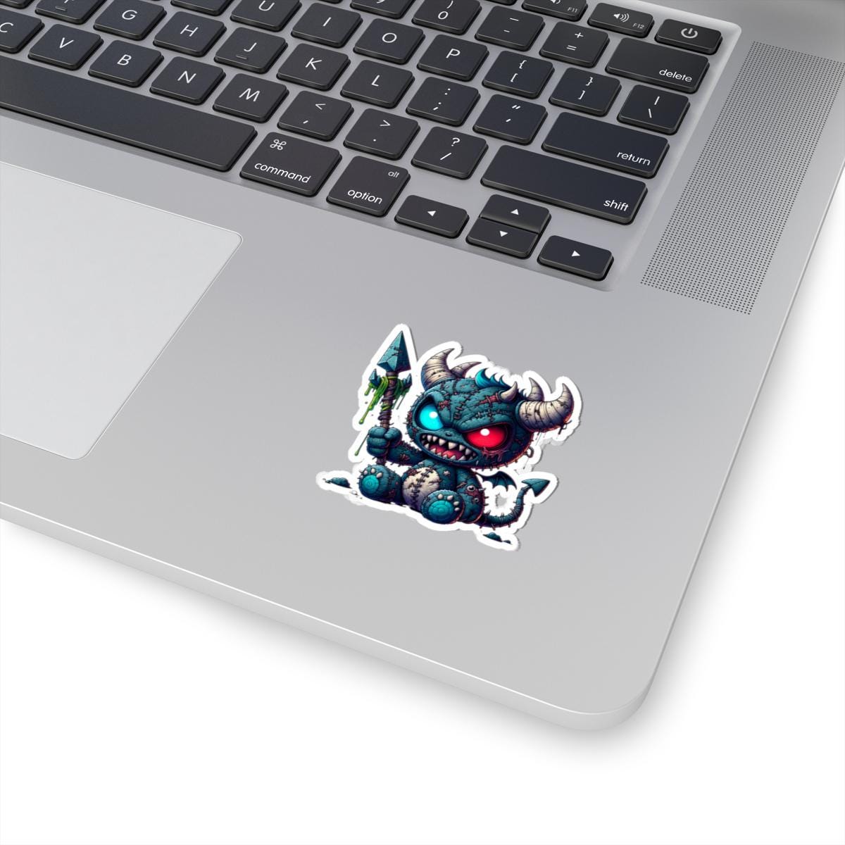 ColorFlow | Stitched Demon Plushie Monster Vinyl Sticker | Dual Eye Art Decal | Unique Collectible | Fantasy Gift Idea